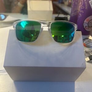 Oakley Sunglasses with Green Lenses and Clear Frame